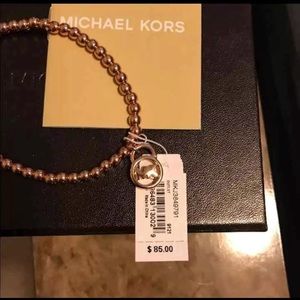 Mk Gold charm bracelet